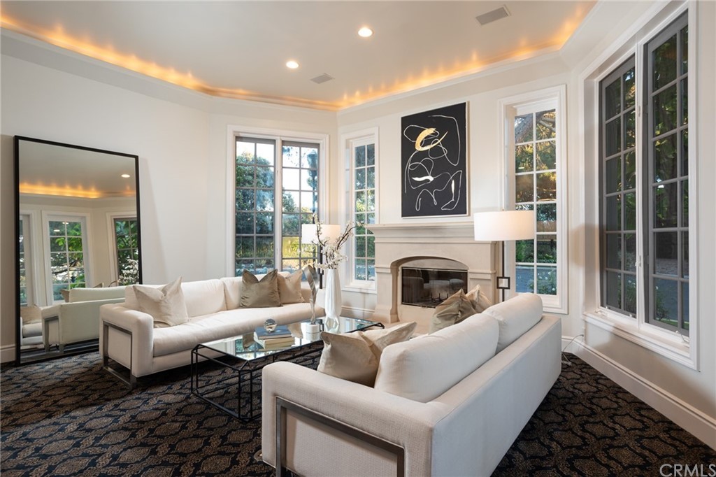 40 Smithcliffs Road Laguna Beach, CA 92651 - Photo 6 of 50 a living room with furniture and a fireplace