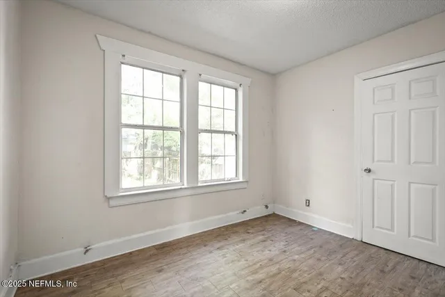 an empty room with windows