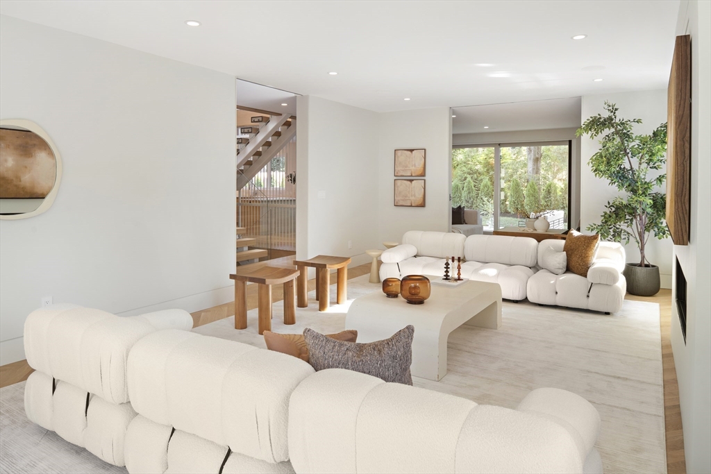 115 Mandalay Road Newton, MA 02459 - Photo 12 of 27 a living room with furniture and a large window