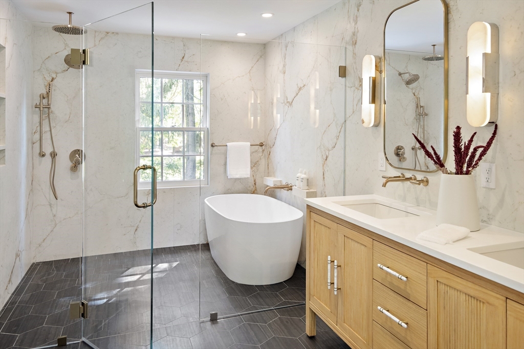 115 Mandalay Road Newton, MA 02459 - Photo 17 of 27 a bathroom with a tub sink and mirror