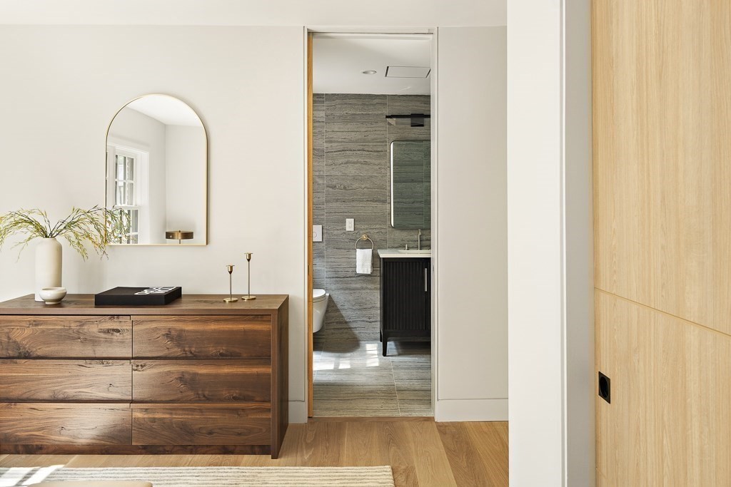 115 Mandalay Road Newton, MA 02459 - Photo 18 of 27 a bathroom with a sink and a mirror