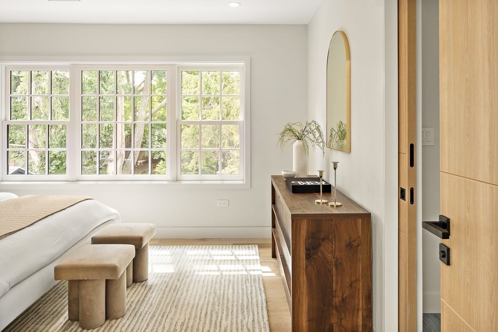 115 Mandalay Road Newton, MA 02459 - Photo 20 of 27 a bathroom with a sink a toilet and a window
