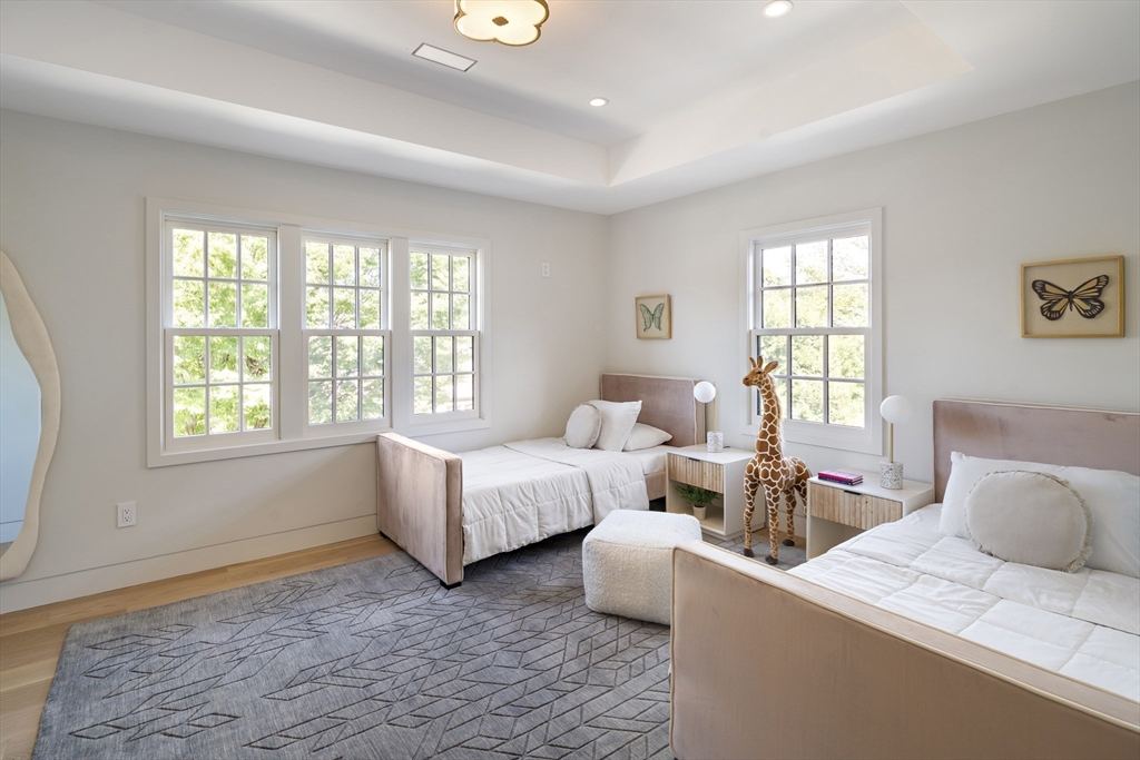 115 Mandalay Road Newton, MA 02459 - Photo 21 of 27 a bed room with two beds and a large window