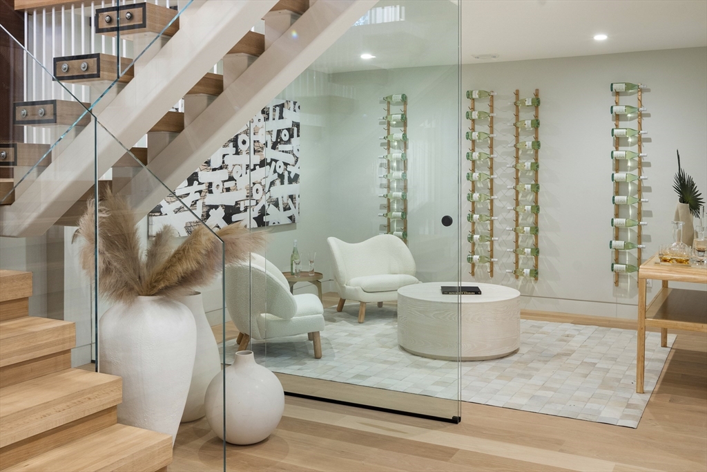 115 Mandalay Road Newton, MA 02459 - Photo 23 of 27 a living room with furniture and wooden floor