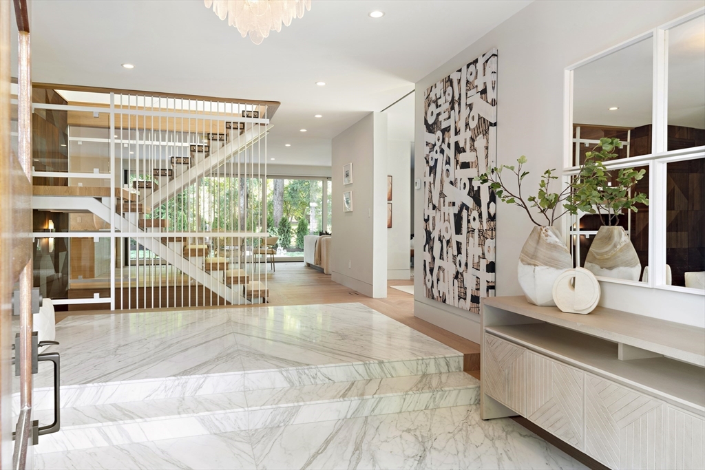 115 Mandalay Road Newton, MA 02459 - Photo 3 of 27 a view of front door with wooden floor