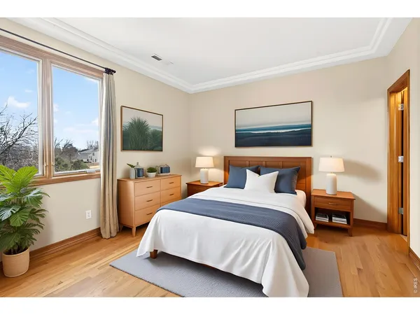 a kitchen with stainless steel appliances kitchen island granite countertop a table chairs and a refrigerator