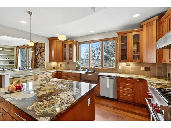 a large bathroom with a sink a large mirror and a bathtub