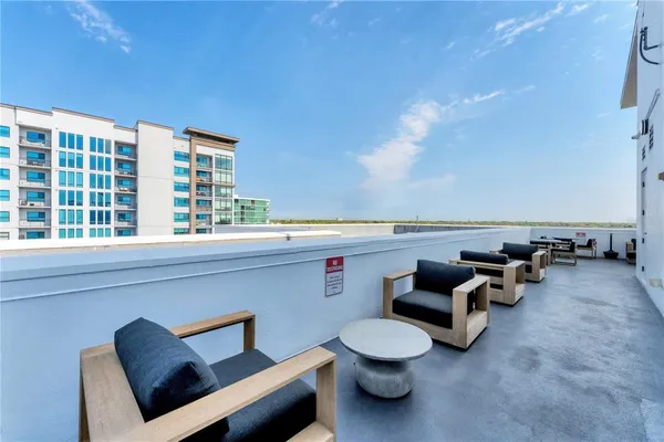 a view of a patio with swimming pool