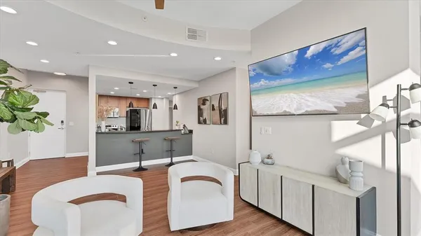 a living room with furniture and a table