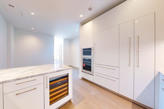 an empty room with a large window