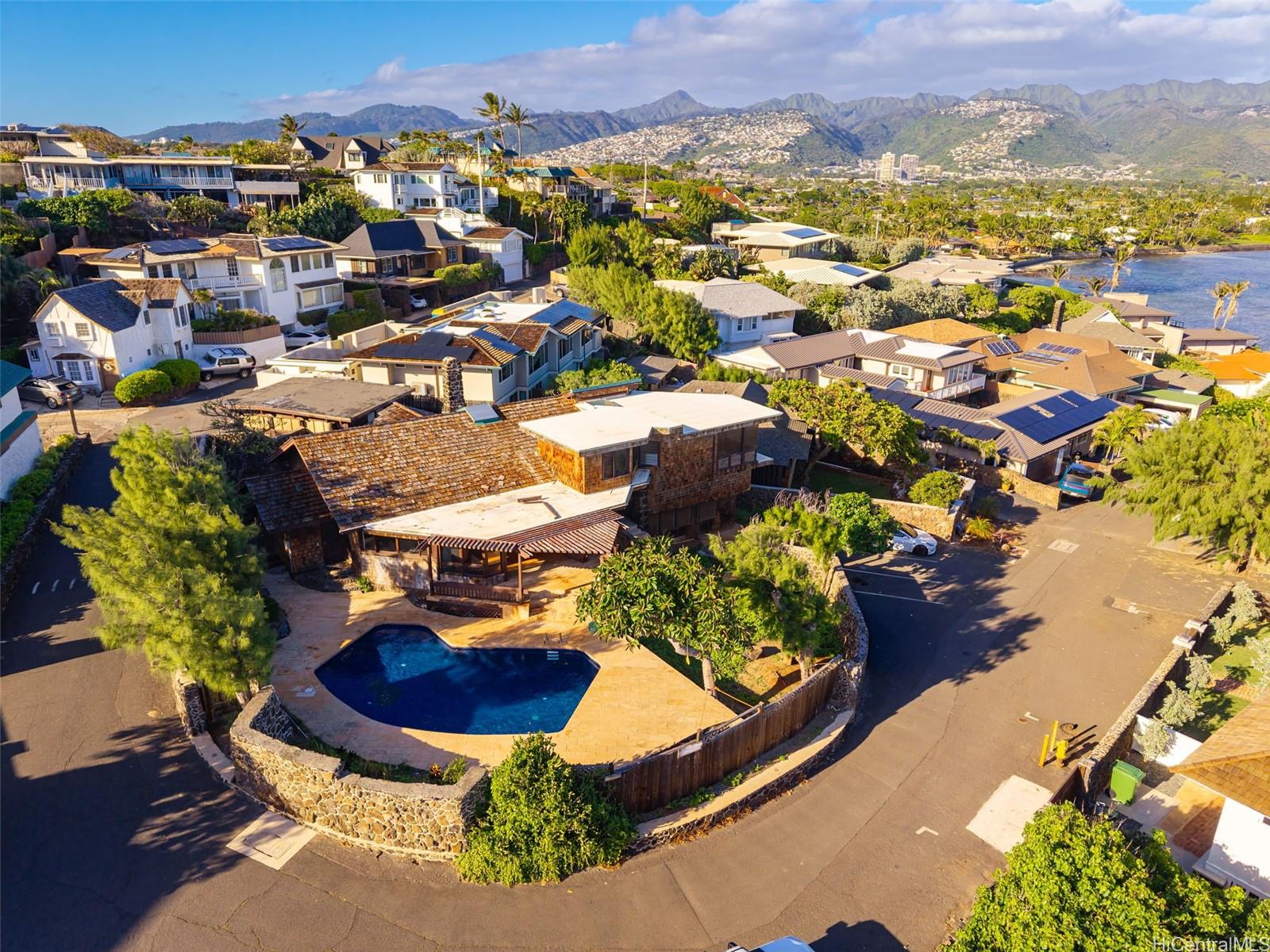 4134 Black Point Road Honolulu, HI 96816 - Photo 17 of 25 an aerial view of residential houses with outdoor space