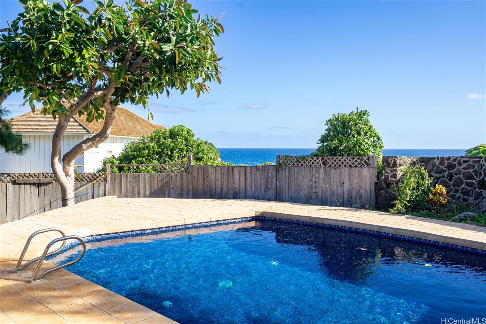 4134 Black Point Road Honolulu, HI 96816 - Photo 9 of 25 a wooden fence with a yard