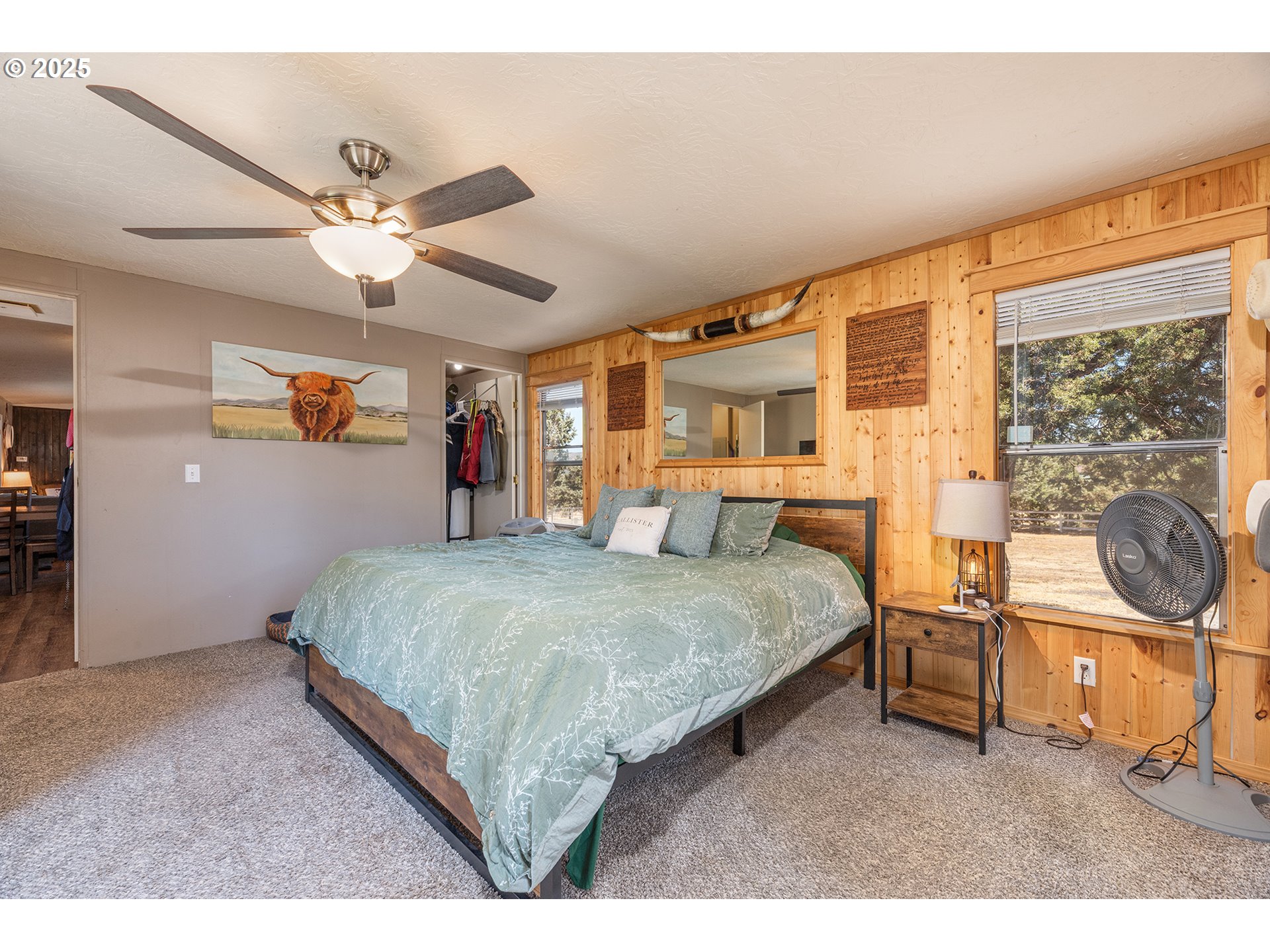 13406 Southwest Oasis Court Terrebonne, OR 97760 - Photo 13 of 48 a bedroom with a bed a dresser and next to a window