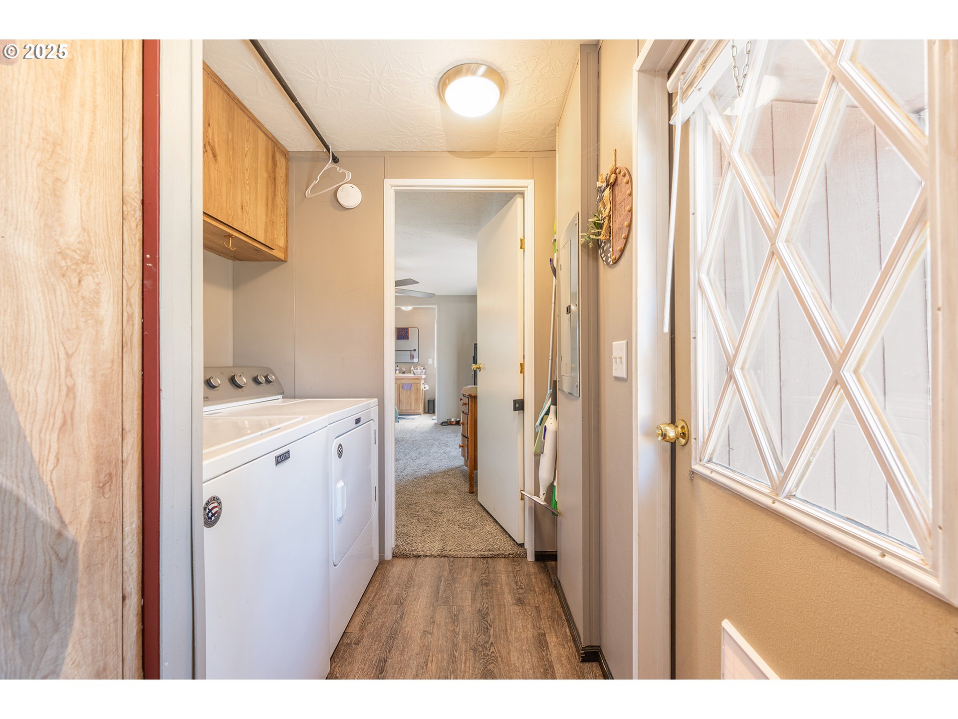 13406 Southwest Oasis Court Terrebonne, OR 97760 - Photo 21 of 48 a bathroom with a double vanity sink and mirror with shower