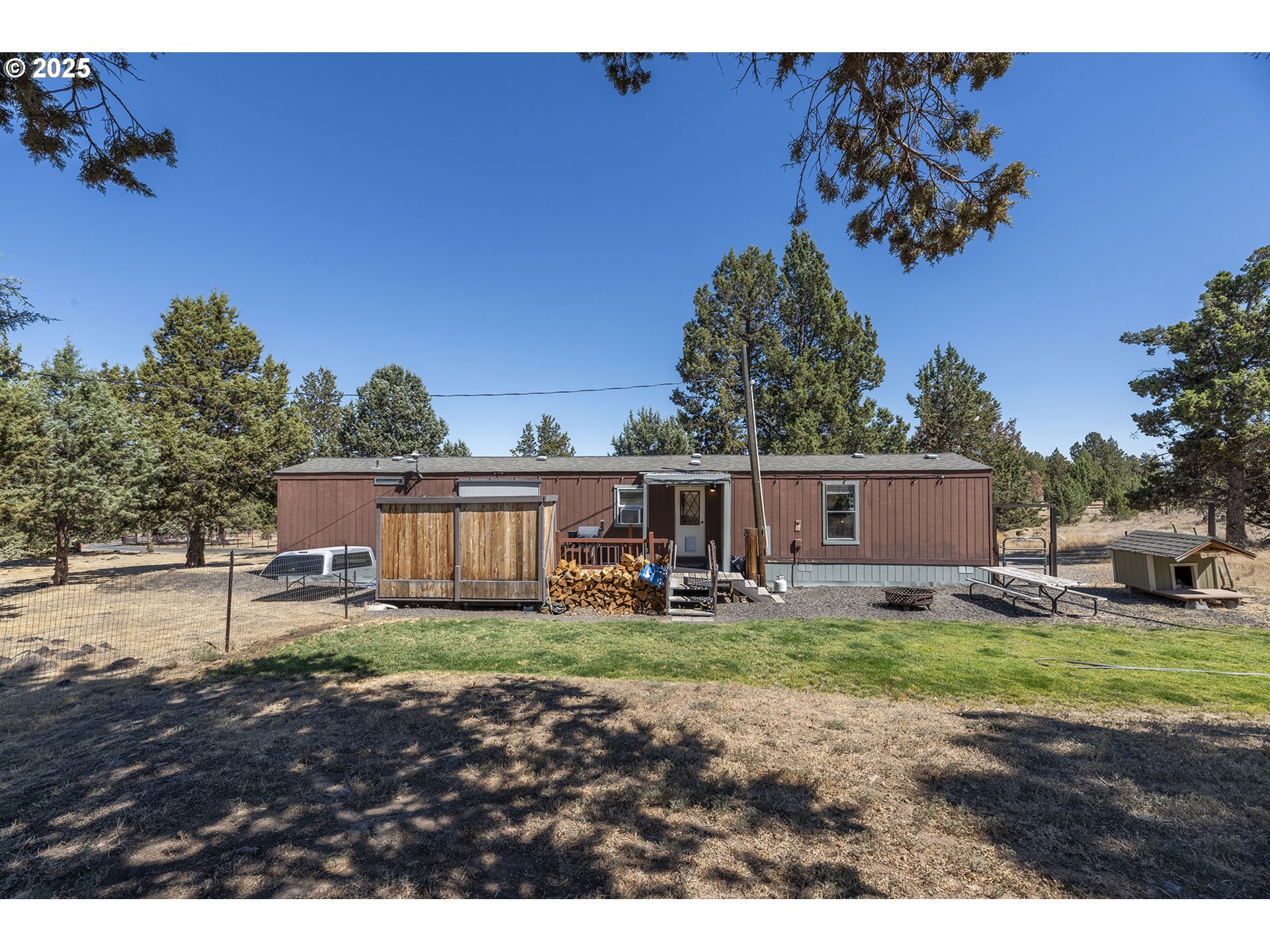 13406 Southwest Oasis Court Terrebonne, OR 97760 - Photo 25 of 48 a house view with a sitting space and garden