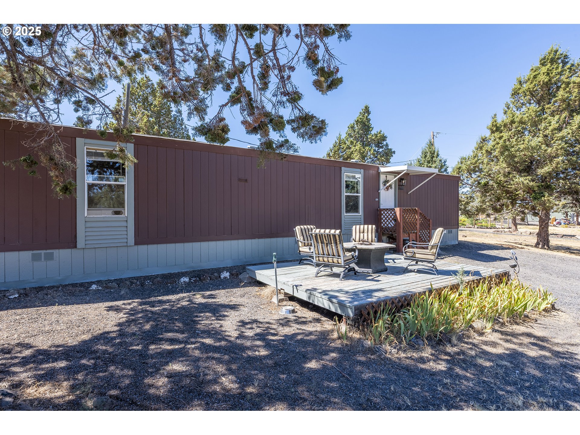 13406 Southwest Oasis Court Terrebonne, OR 97760 - Photo 3 of 48 a view of a house with backyard