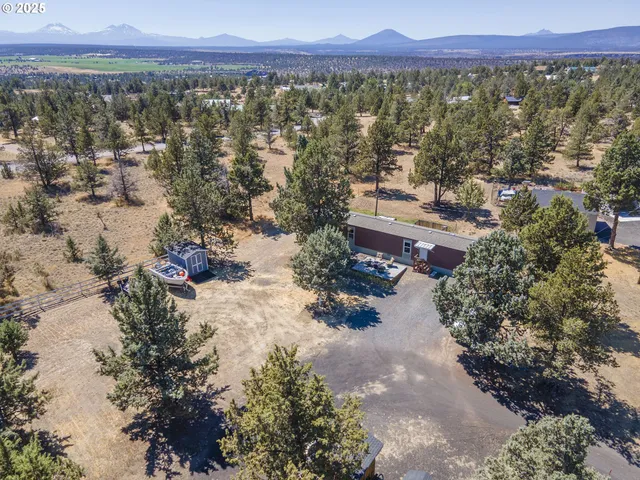 a view of a city with mountains in the background
