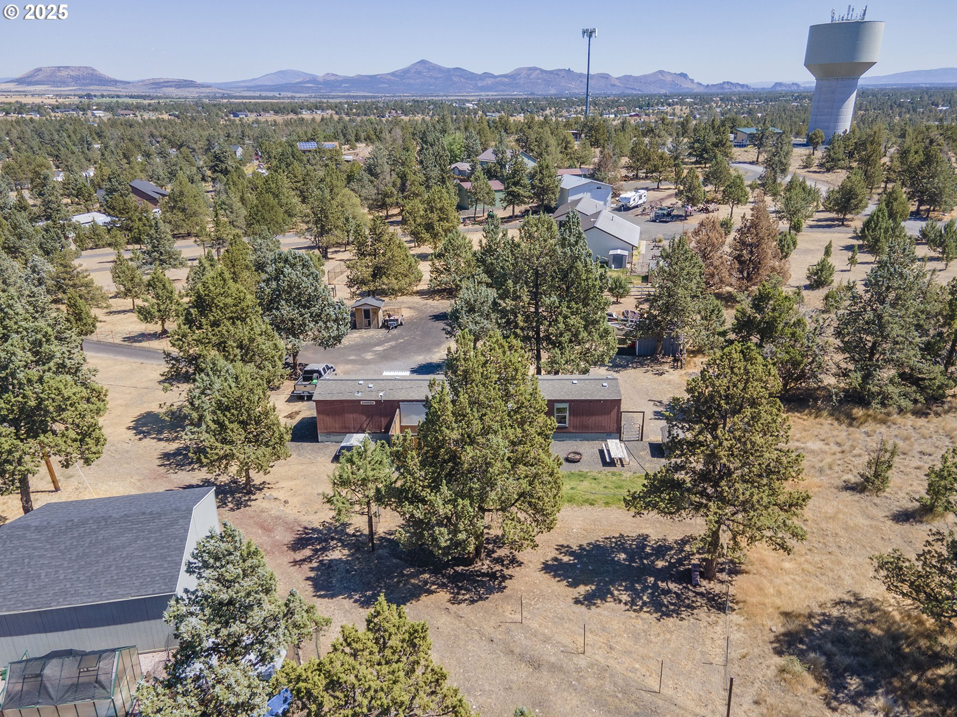 13406 Southwest Oasis Court Terrebonne, OR 97760 - Photo 36 of 48 a view of a city with a building in the background