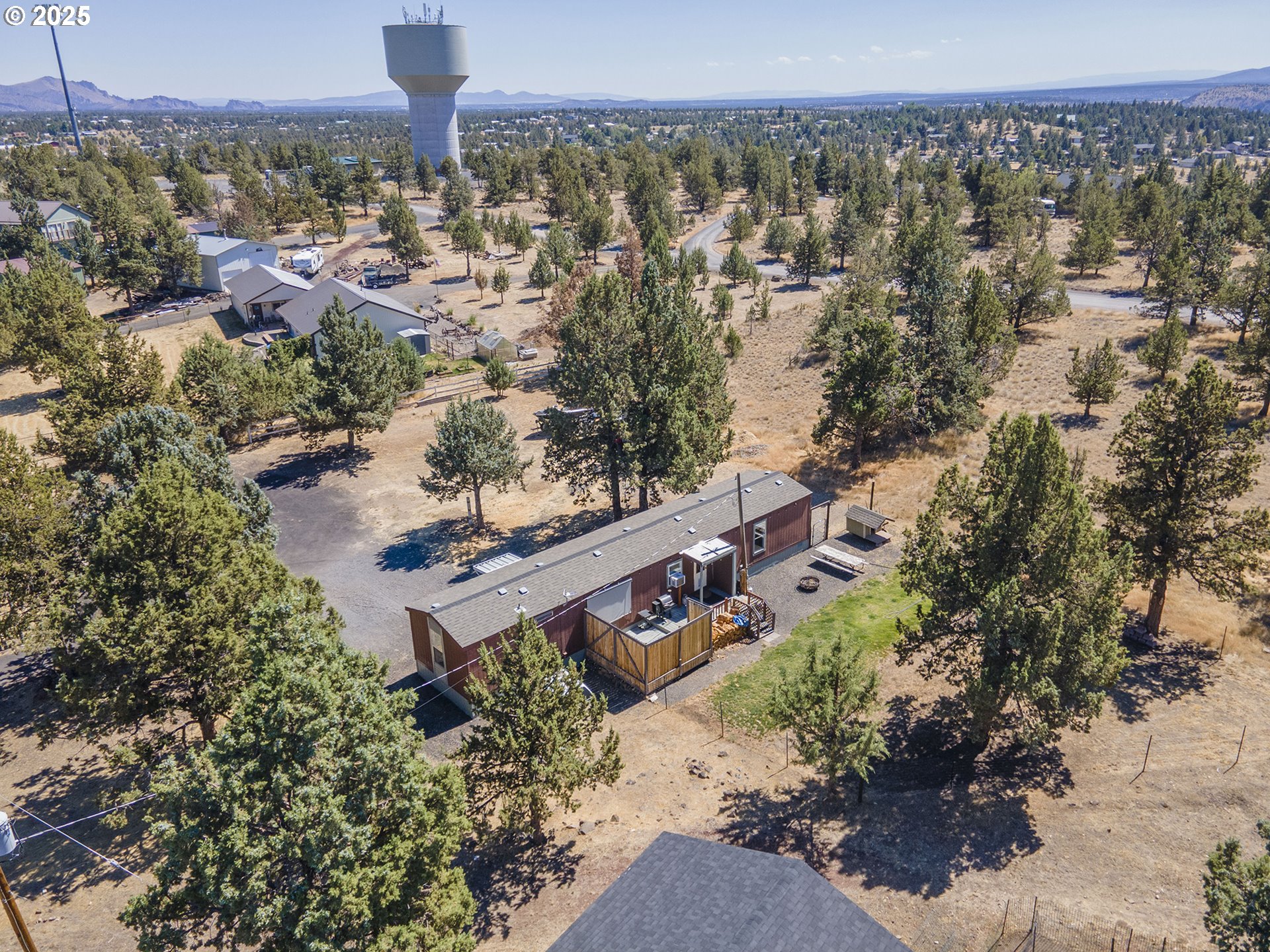 13406 Southwest Oasis Court Terrebonne, OR 97760 - Photo 37 of 48 an aerial view of a house with a yard and lake view