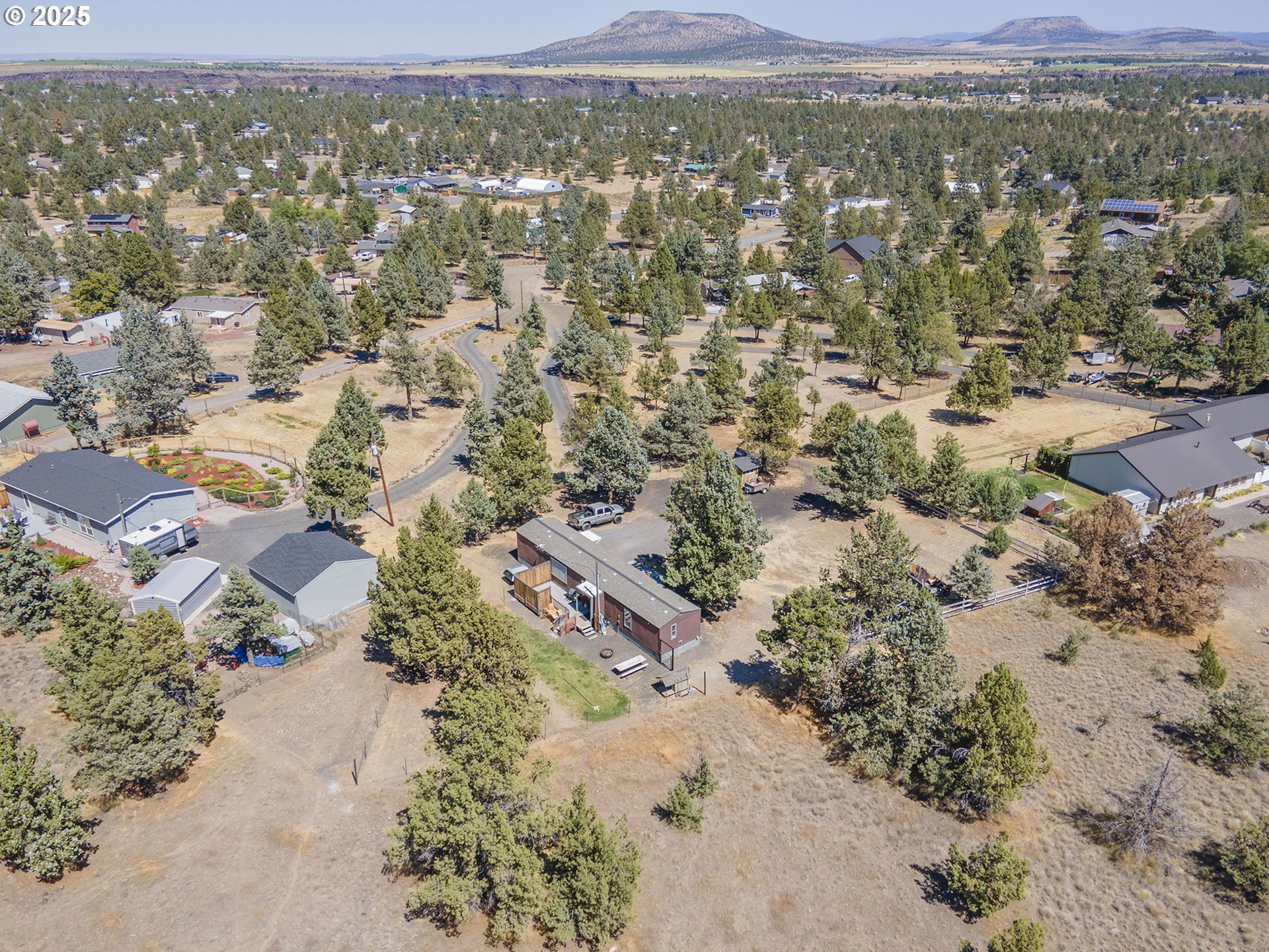 13406 Southwest Oasis Court Terrebonne, OR 97760 - Photo 38 of 48 an aerial view of residential houses with outdoor space