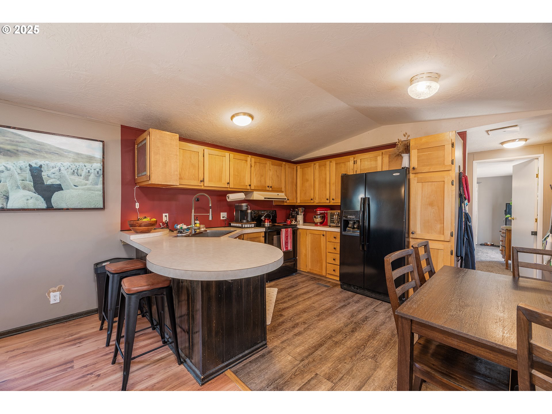 13406 Southwest Oasis Court Terrebonne, OR 97760 - Photo 7 of 48 a view of a dining room with furniture window and wooden floor