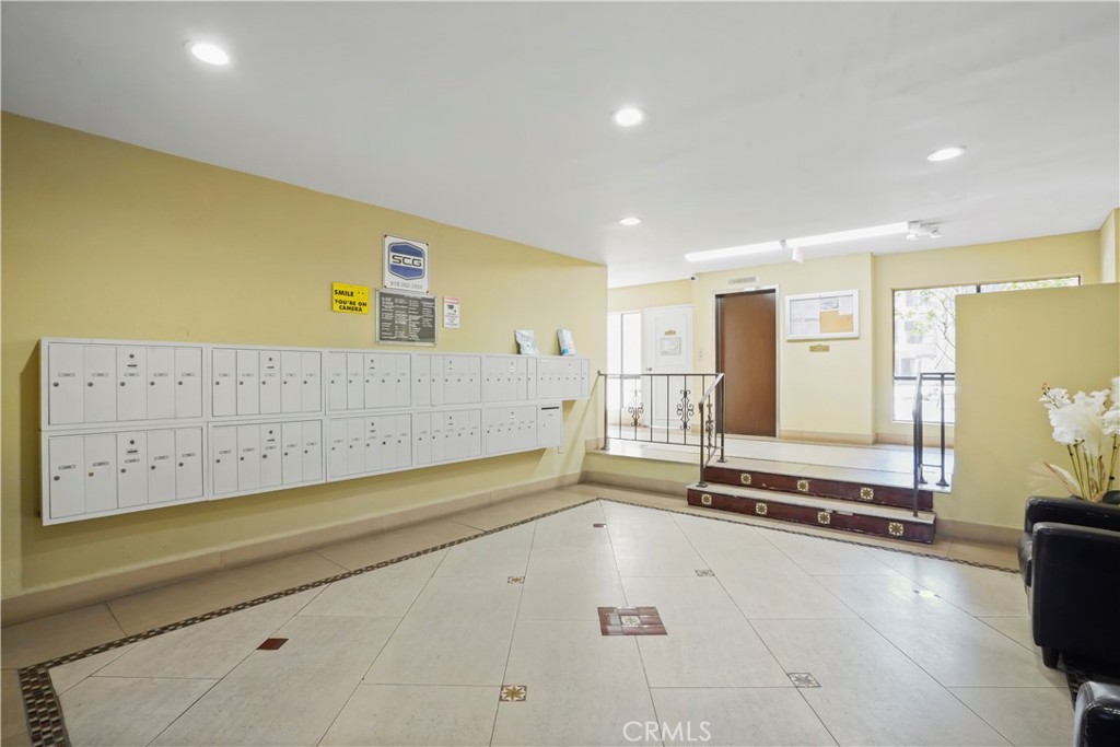 1730 Camino Palmero Street, Unit 316 Los Angeles, CA 90046 - Photo 22 of 27 a view of a room with gym equipment