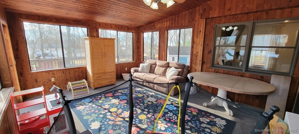 48 Saddle Road Wolcott, CT 06716 - Photo 20 of 40 a living room with furniture and a window