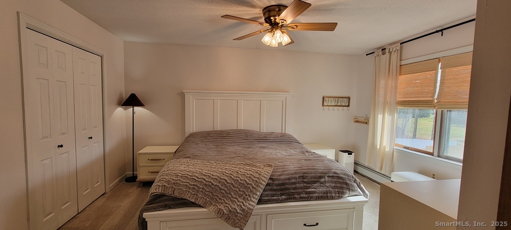 48 Saddle Road Wolcott, CT 06716 - Photo 25 of 40 a bedroom with a bed and a window