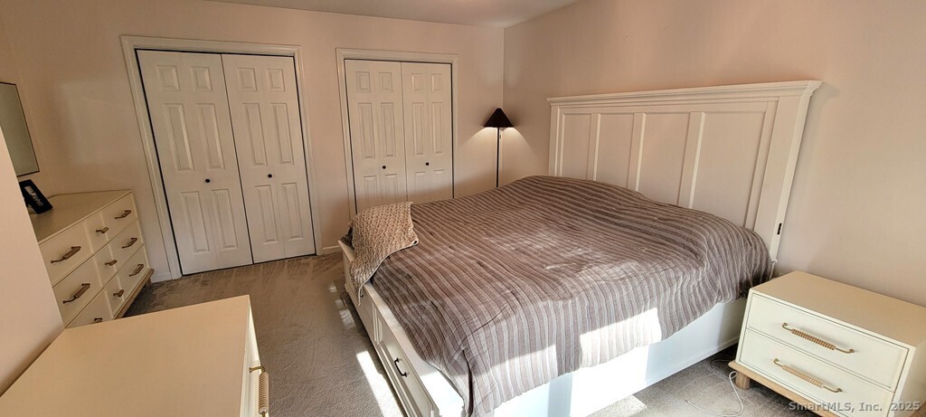 48 Saddle Road Wolcott, CT 06716 - Photo 26 of 40 a bedroom with a bed and a tv