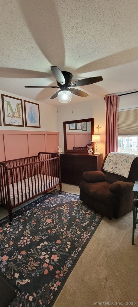 48 Saddle Road Wolcott, CT 06716 - Photo 30 of 40 a bedroom with double bed and a window