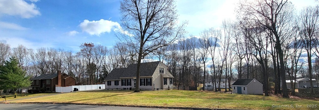 48 Saddle Road Wolcott, CT 06716 - Photo 35 of 40 a house with swimming pool in front of it