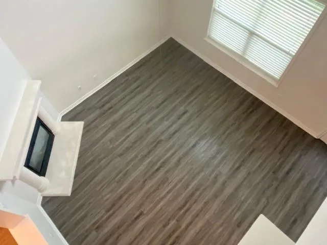 a view of wooden floor and living room