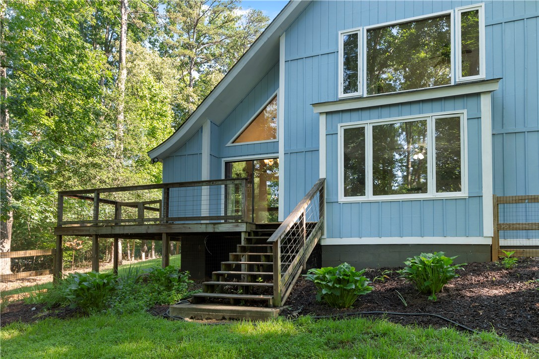1298 Carradine Road Seneca, SC 29678 - Photo 3 of 43 A sprawling wrap-around deck offers serene outdoor living.