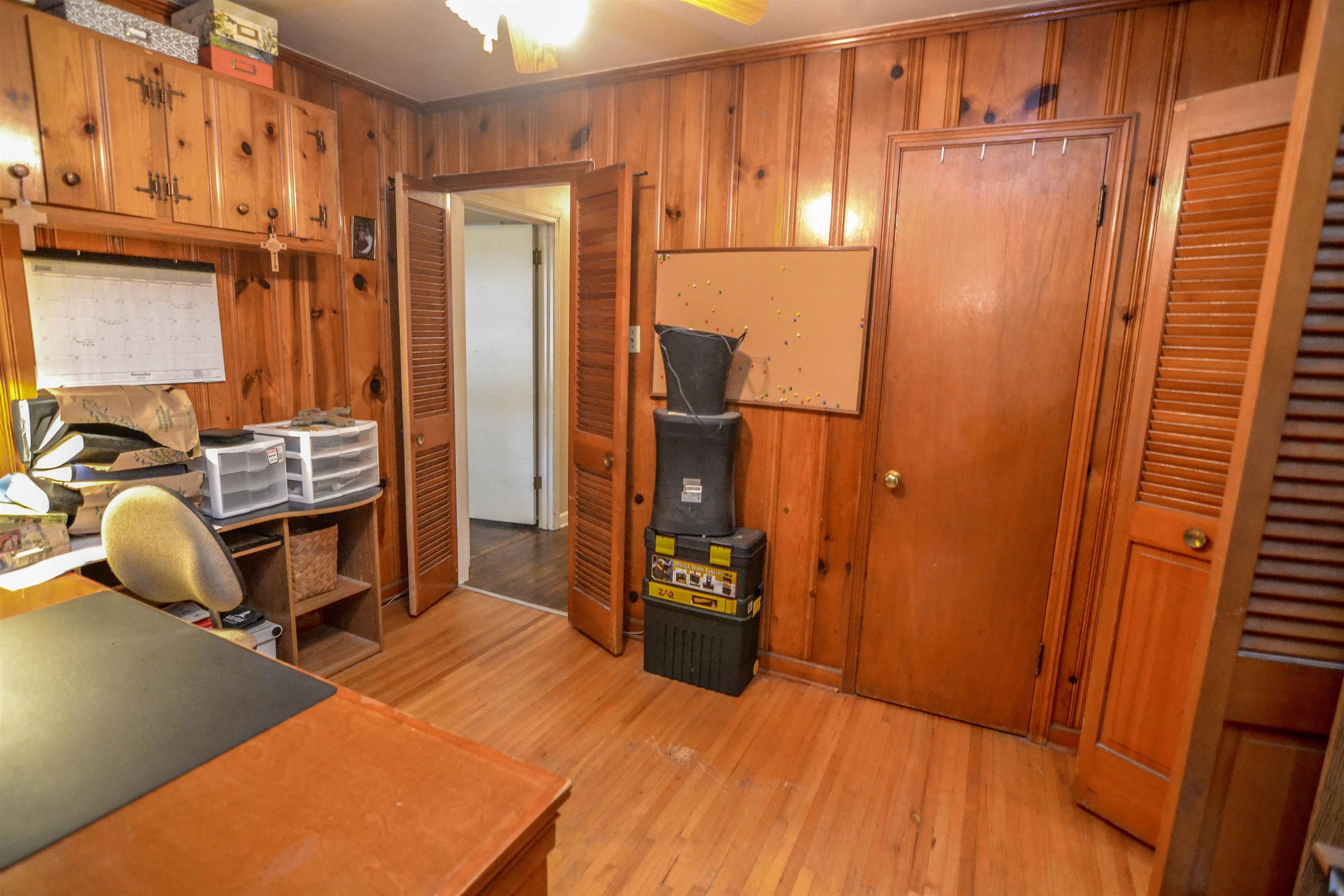 4686 Willow Road Memphis, TN 38117 - Photo 17 of 25 a room with two chairs and a refrigerator