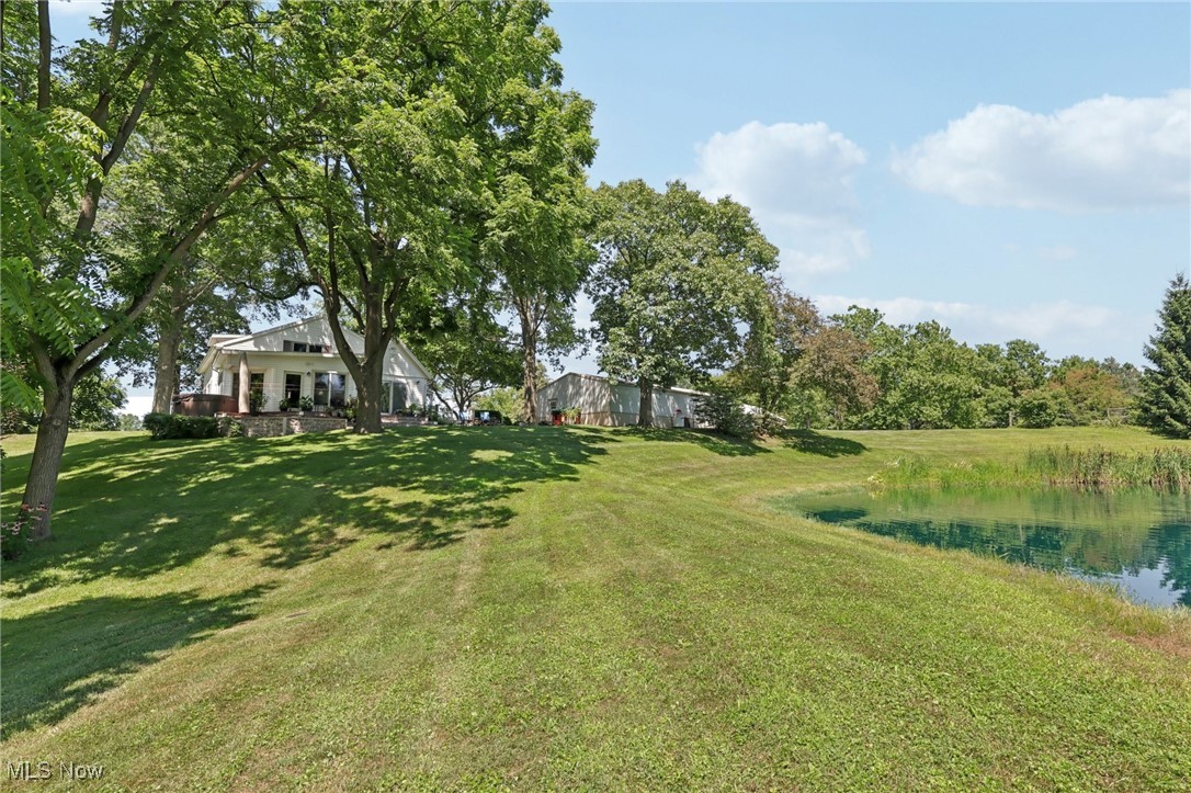 6414 Tennant Road Collins, OH 44826 - Photo 46 of 50 View of grassy yard with a water view
