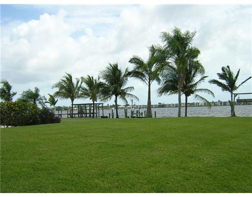2391 Southwest Riverside Drive Palm City, FL 34990 - Photo 3 of 8 a view of a park with palm trees