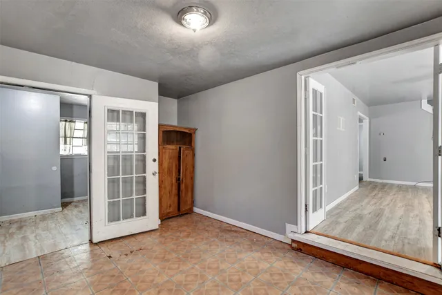 an empty room with windows