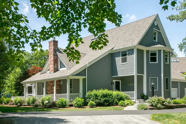 front view of a house with a yard