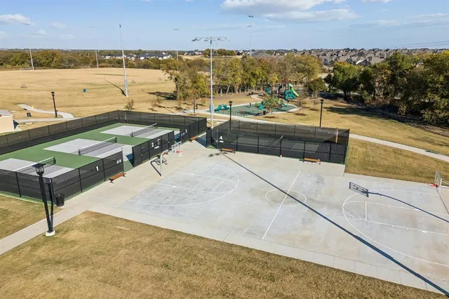 a view of a terrace with outdoor seating and city view