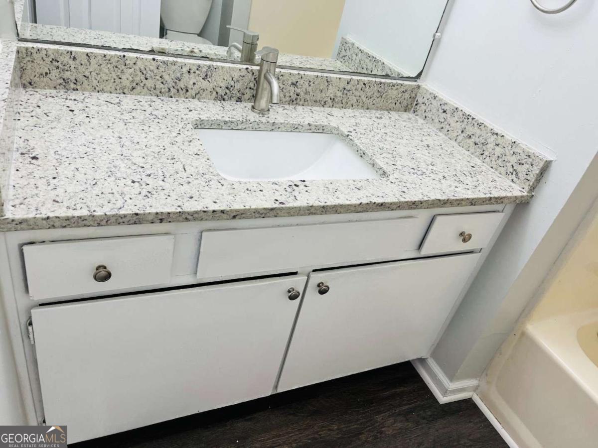 5614 Windwood Road, Unit 5614 Atlanta, GA 30349 - Photo 26 of 26 a close view of sink and tap