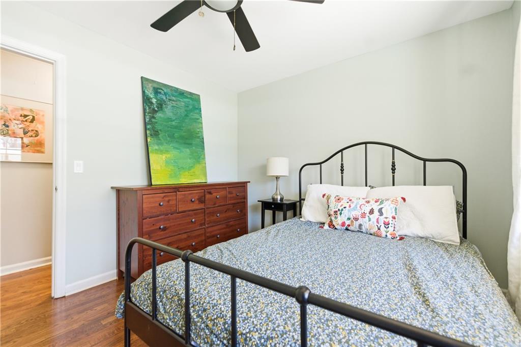 2864 Briarlake Road Northeast Atlanta, GA 30345 - Photo 20 of 77 a bed sitting in a bedroom next to a window