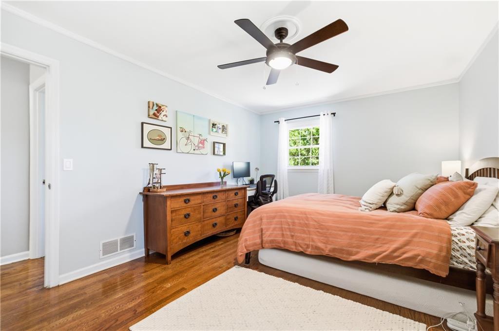 2864 Briarlake Road Northeast Atlanta, GA 30345 - Photo 30 of 77 a bedroom with two beds and a window