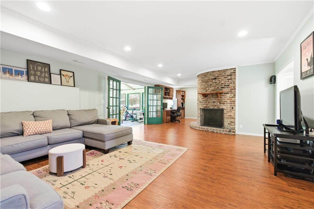 2864 Briarlake Road Northeast Atlanta, GA 30345 - Photo 38 of 77 a living room with fireplace furniture and a flat screen tv