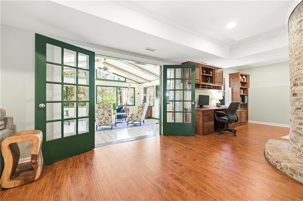 2864 Briarlake Road Northeast Atlanta, GA 30345 - Photo 42 of 77 a living room with furniture large window and wooden floor