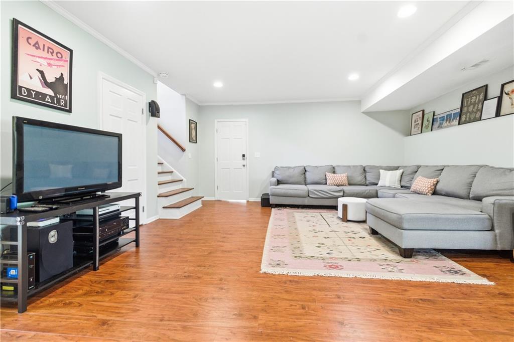 2864 Briarlake Road Northeast Atlanta, GA 30345 - Photo 43 of 77 a living room with furniture and a flat screen tv