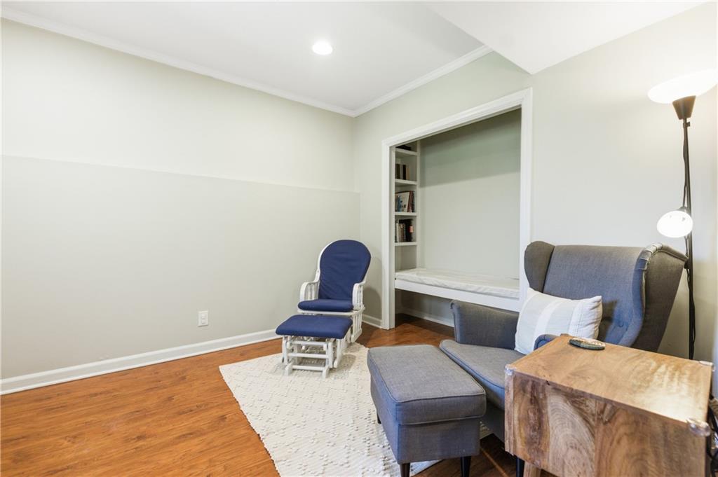 2864 Briarlake Road Northeast Atlanta, GA 30345 - Photo 44 of 77 a living room with furniture and a chair
