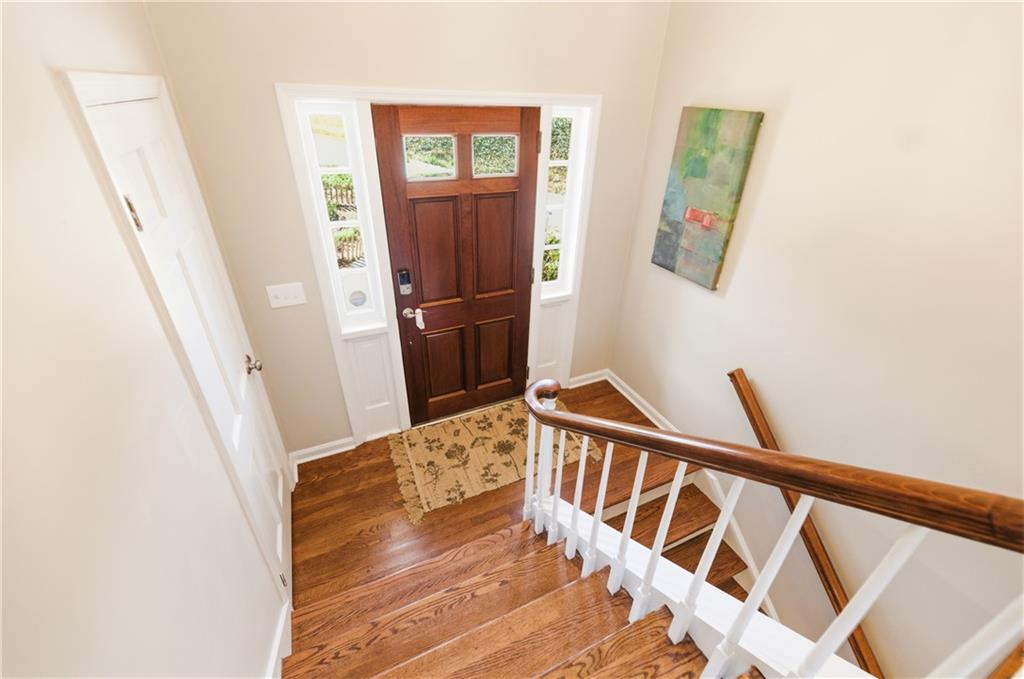 2864 Briarlake Road Northeast Atlanta, GA 30345 - Photo 46 of 77 a view of entryway with stairs and wooden floor