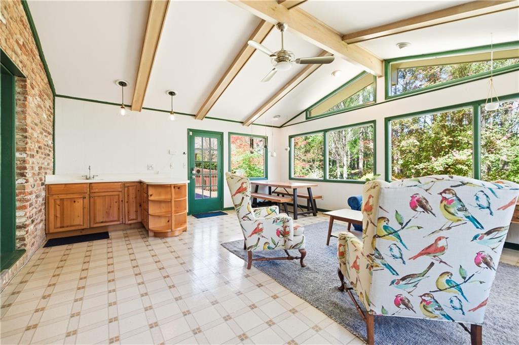 2864 Briarlake Road Northeast Atlanta, GA 30345 - Photo 50 of 77 a living room with furniture and a large window