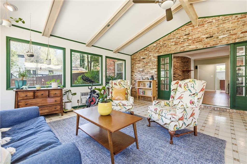 2864 Briarlake Road Northeast Atlanta, GA 30345 - Photo 52 of 77 a living room with furniture and a large window