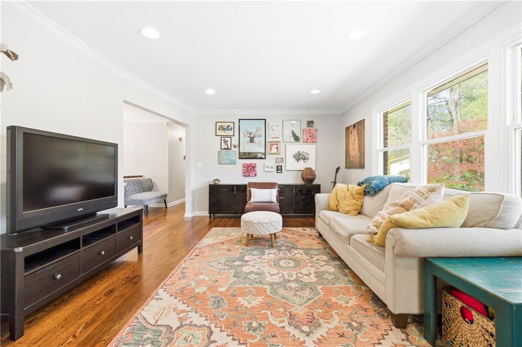 2864 Briarlake Road Northeast Atlanta, GA 30345 - Photo 7 of 77 a living room with furniture and a flat screen tv